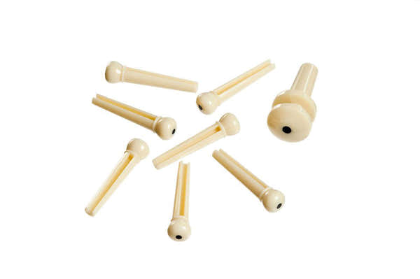 D'ADDARIO INJECTED MOLDED BRIDGE PINS WITH END PIN SET OF 7 IVORY WITH BLACK DOT